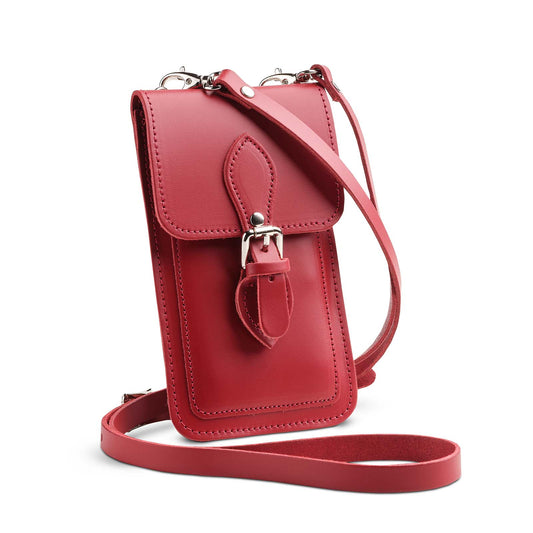Luxury handmade red leather mobile phone pouch by Zatchels with adjustable crossbody strap, showcasing premium craftsmanship and elegance.