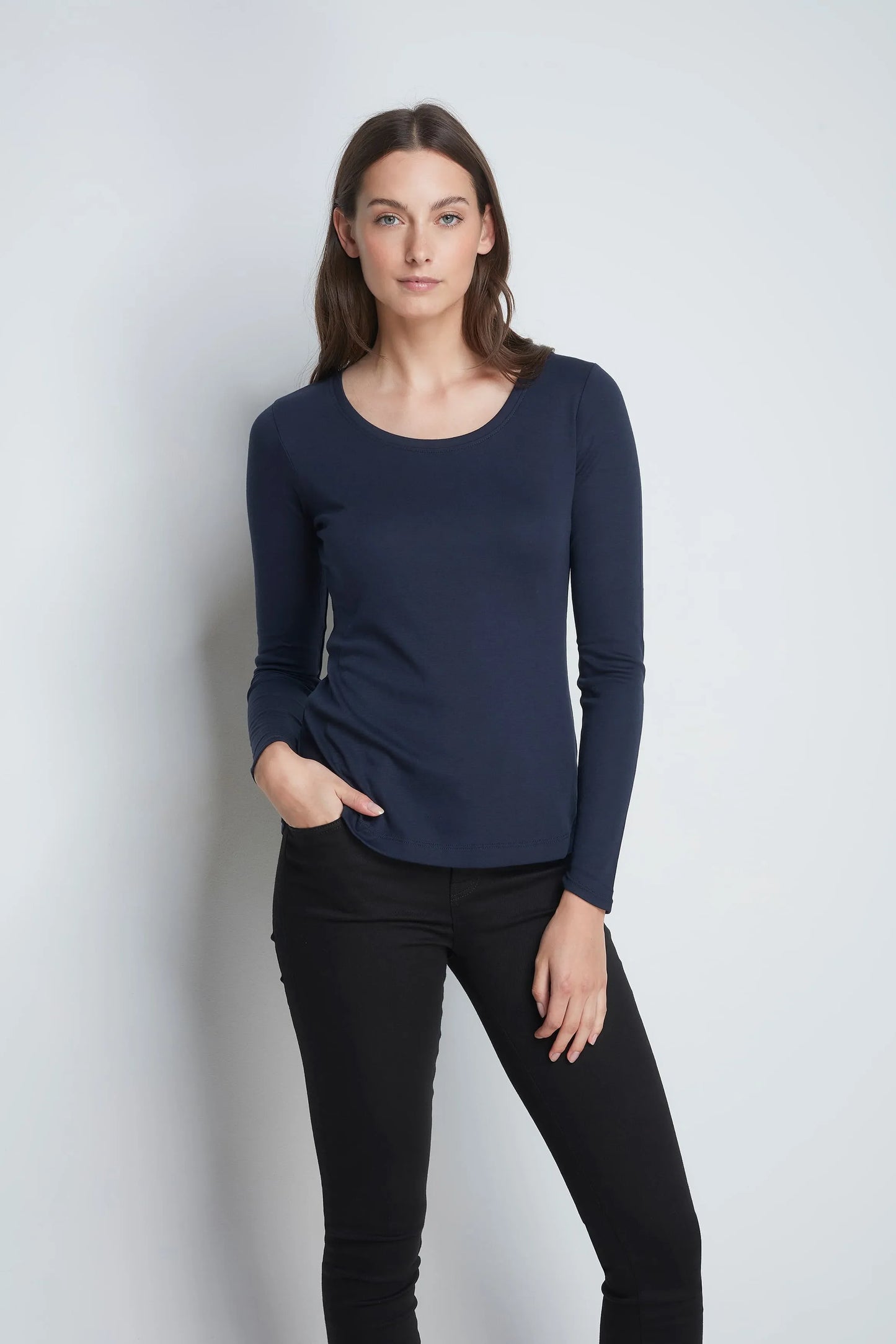 Close-up view of the cotton modal blend fabric of the women's long sleeve scoop neck t-shirt, illustrating its smooth texture and luxurious comfort for all-day wear.