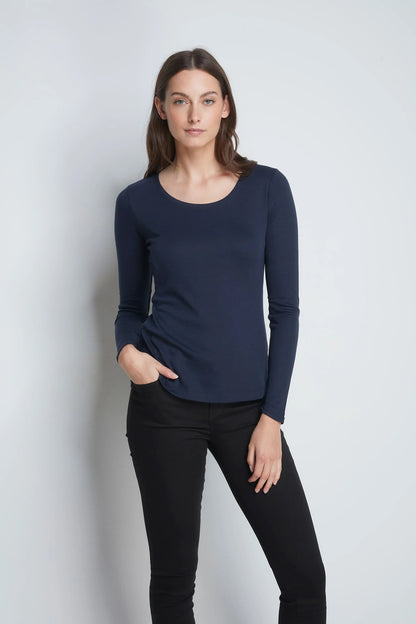 Close-up view of the cotton modal blend fabric of the women's long sleeve scoop neck t-shirt, illustrating its smooth texture and luxurious comfort for all-day wear.