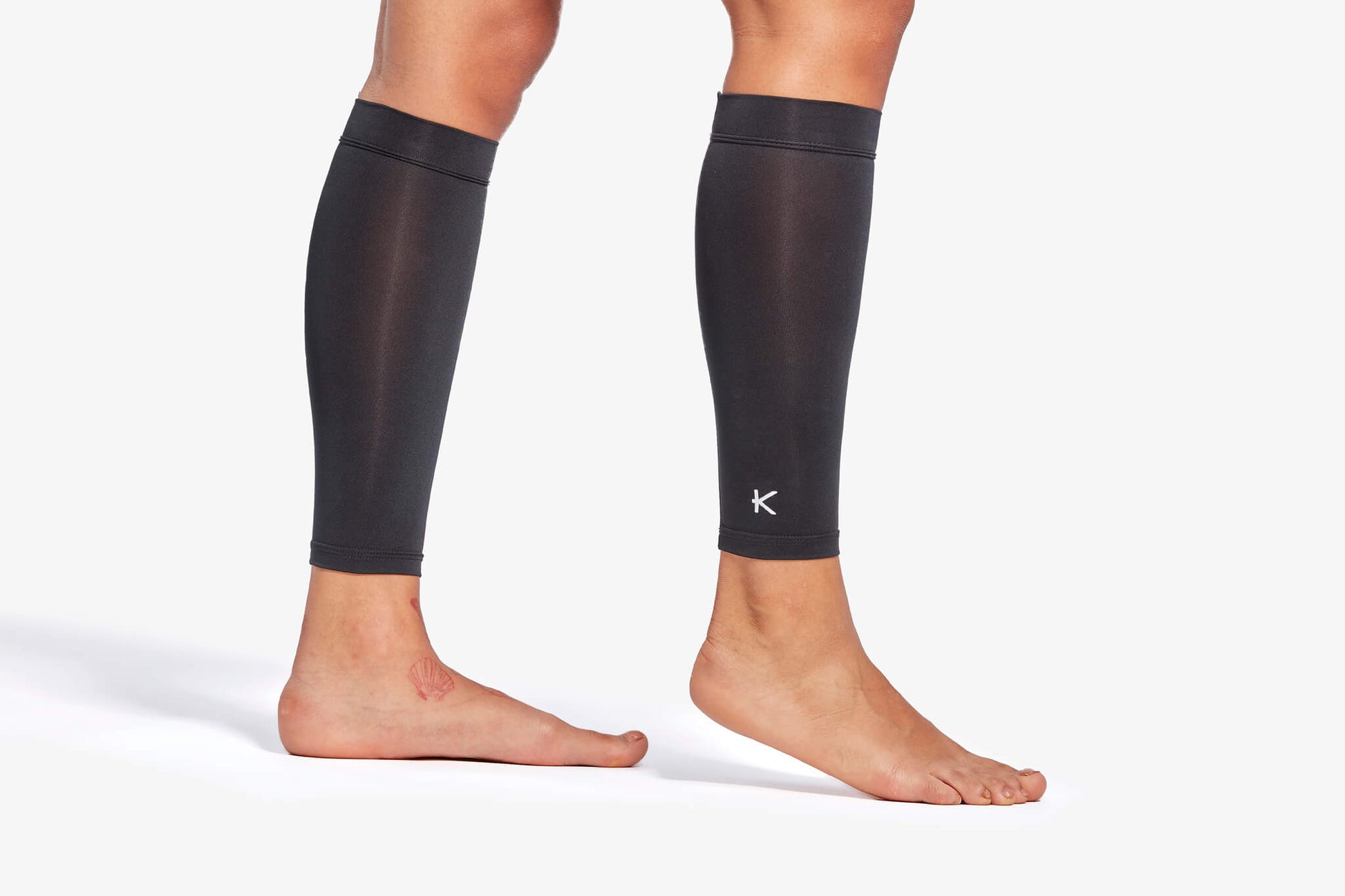 KYMIRA Infrared Pro Calf Sleeves displayed in multiple sizes, offering luxurious support for athletic recovery.