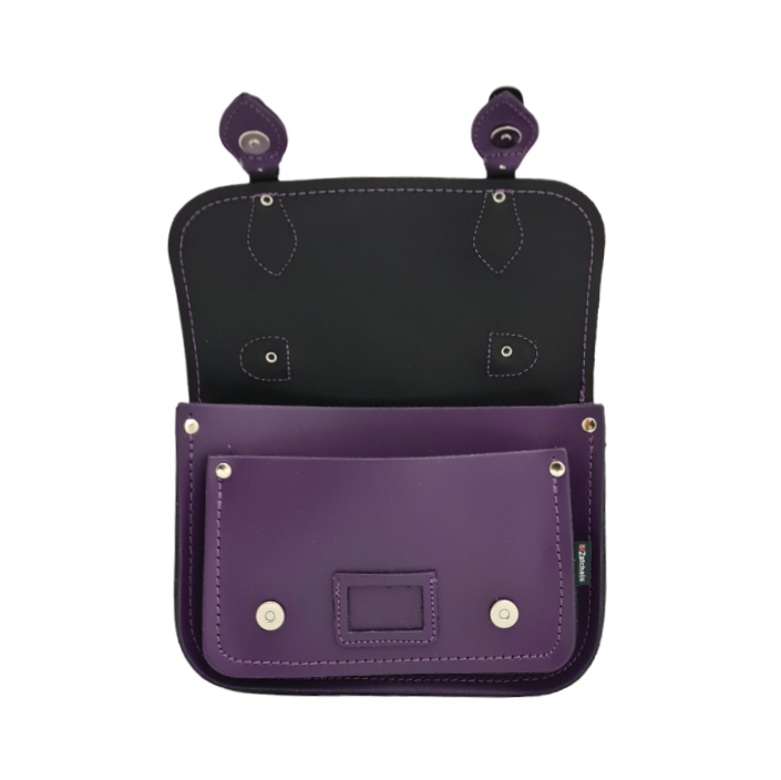 Spacious interior of the handmade purple leather satchel, designed to fit essentials like smartphones, wallets, and cosmetics perfectly.