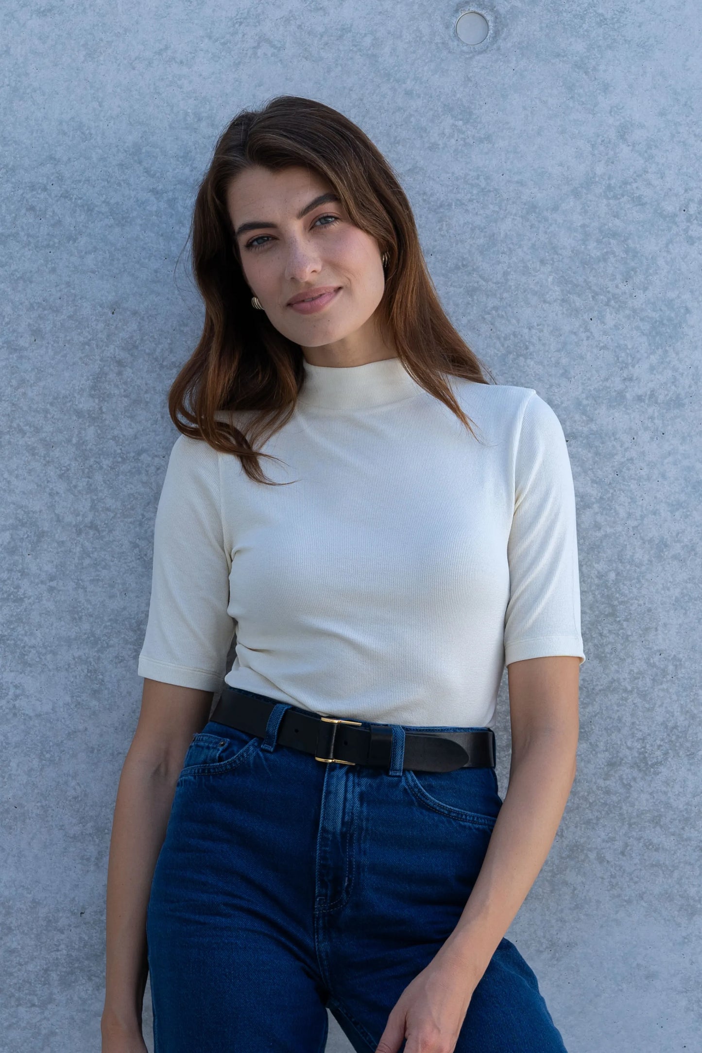 Luxurious Women's Mock Neck Micro Modal Top in Ribbed Half Sleeve, showcasing its soft fabric and elegant silhouette, ideal for sophisticated layering and versatile styling.