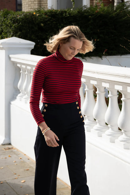 Luxury Women's Striped Long Sleeve Cotton Roll Neck Top in chic design, perfect for layering and stylishly paired with tailored trousers or jeans.