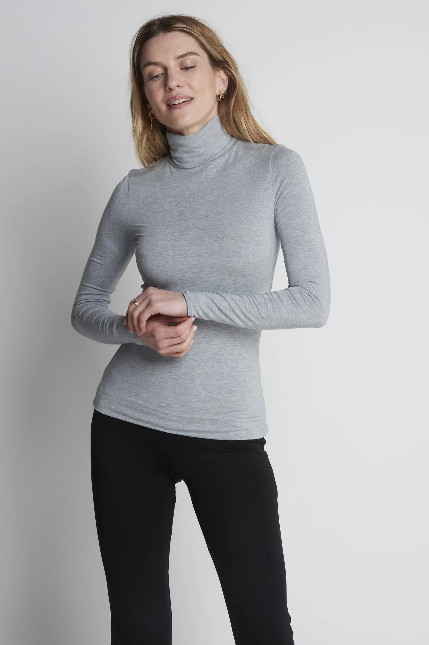 Group of Women's TENCEL™ Micro Modal Roll Neck Tops in various colours, emphasizing sustainable fashion and inclusive sizes 8-18 for every woman.