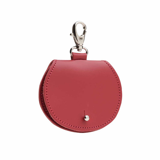 Luxury hand-crafted mini saddle bag coin purse charm in red, made in England by Zatchels, showcasing exquisite craftsmanship and elegant design, perfect for adding a touch of sophistication to any handbag.