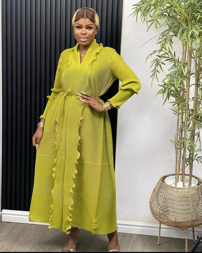 Luxury women’s loose casual abaya dress in elegant ruffle sleeve design, perfect for Eid celebrations, featuring ankle-length cut and chic sashes, crafted from premium polyester.