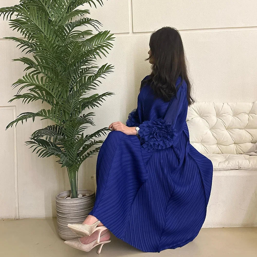 Elegant pleated maxi dress featuring petal sleeves and a sophisticated half turtleneck for women, ideal for formal occasions.
