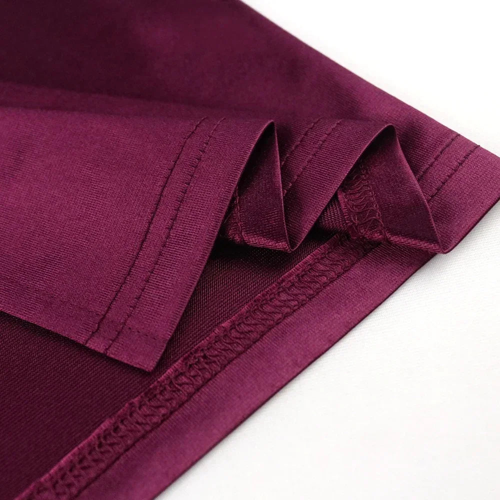 Burgundy Plus Size 4XL Bodycon Dress showcasing a flattering silhouette and luxurious fabric, ideal for evening and cocktail parties.