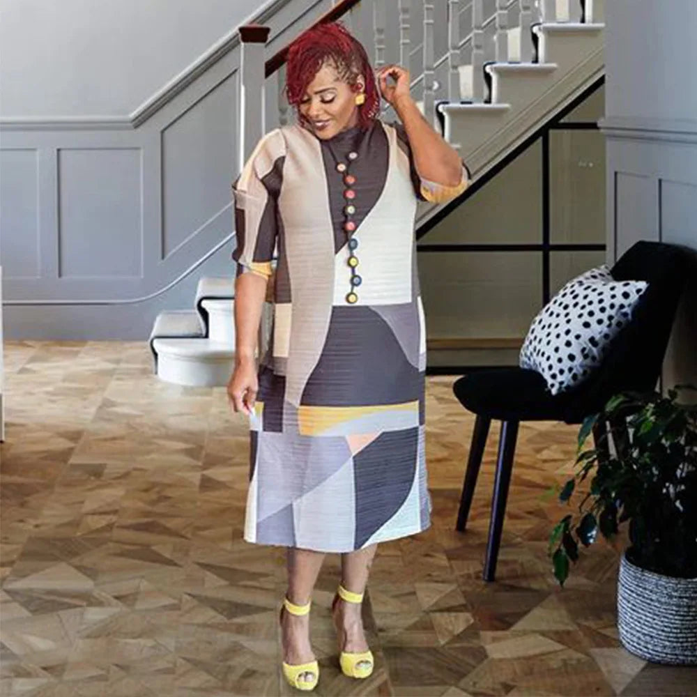 Beautifully crafted long Dashiki dress for women, featuring elegant 3/4 sleeves and made from soft polyester fabric.