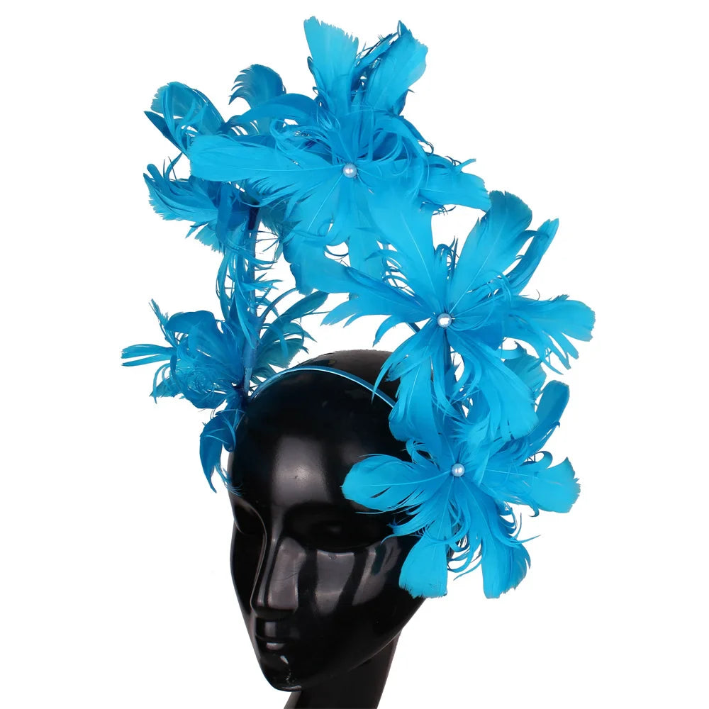 Elegant blue feather wedding headband fascinator for women, perfect accessory for bridal parties and formal occasions.