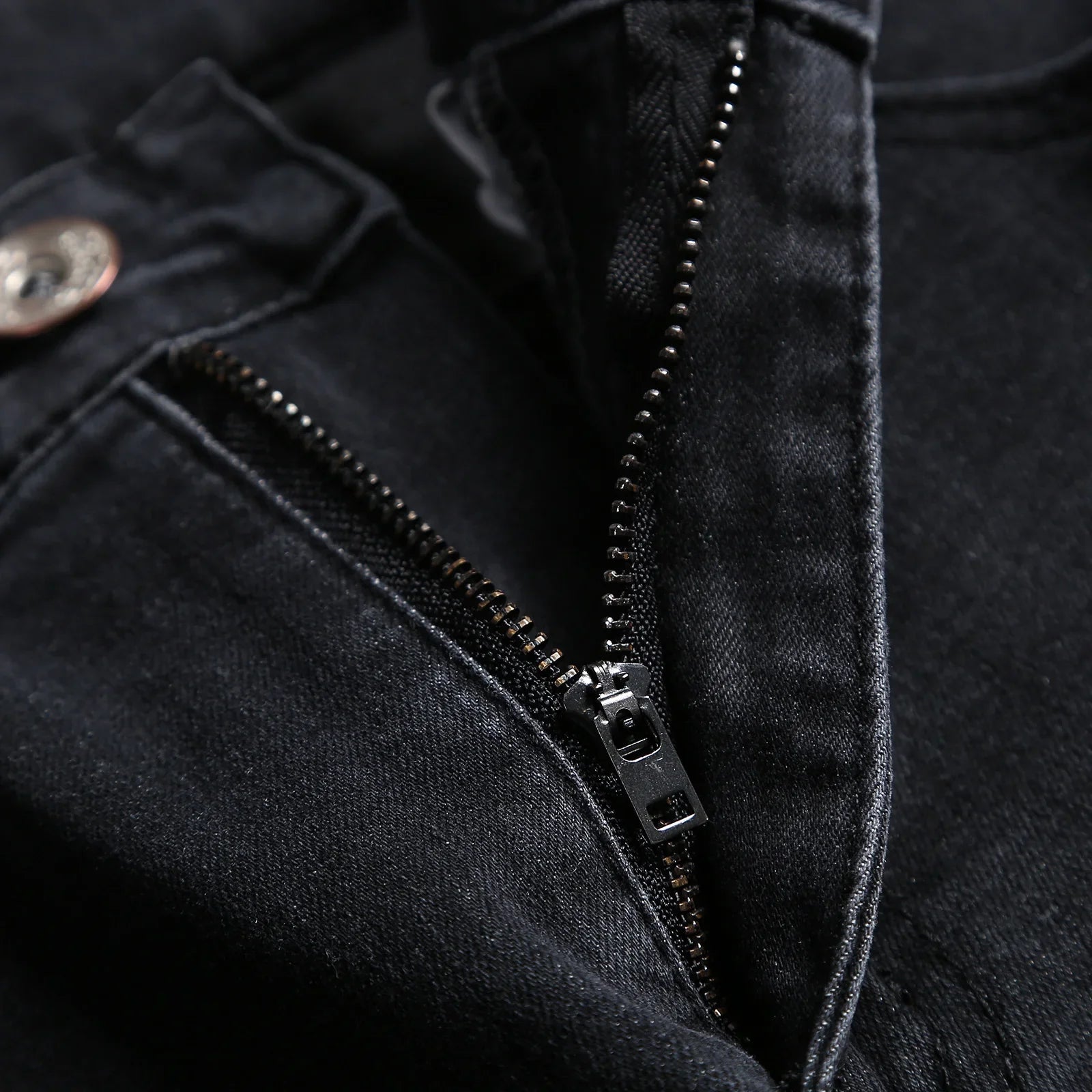 Fashion-forward Luxury Men's Ripped Skinny Jeans, designed in a classic slim fit and ideal for all-season wear.