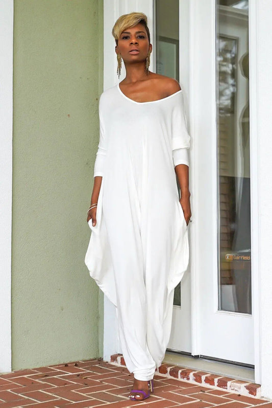 Luxurious back view of the elegant women's long sleeve jumpsuit showcasing its chic loose fit and unique backless detail, ideal for special occasions.