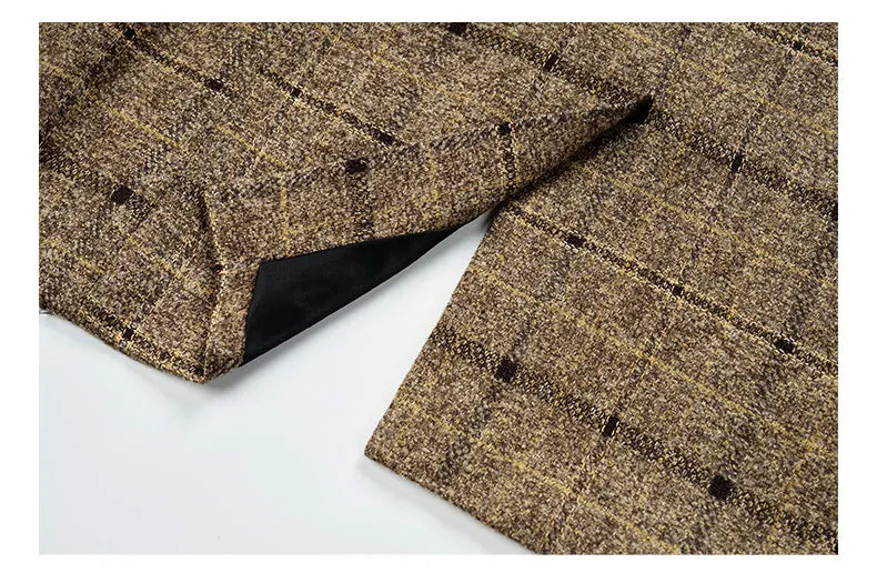 Chic and contemporary men's suit ensemble, highlighting the elegant fit and premium materials for a polished appearance.