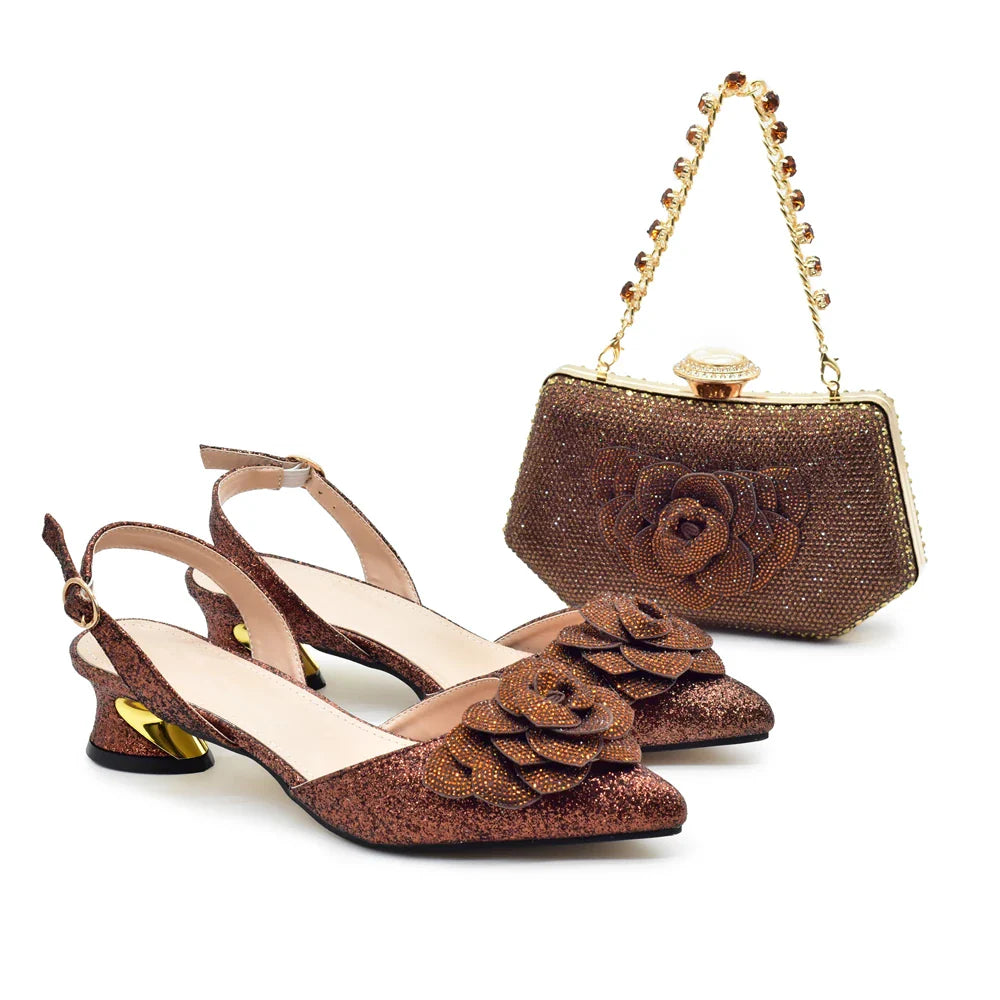 High-heeled pumps adorned with rhinestones, featuring a chic buckle strap, displaying luxury craftsmanship.