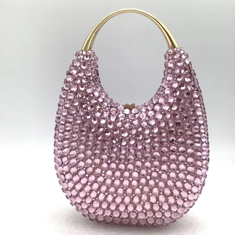 Gorgeous evening clutch bag for women, showcasing a sophisticated design with shimmering crystal accents, ideal for parties and upscale events.