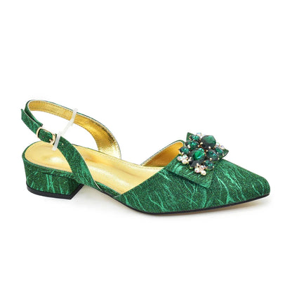 Sophisticated ladies' shoe and handbag ensemble in champagne, featuring a square heel, crafted for elegance and comfort.