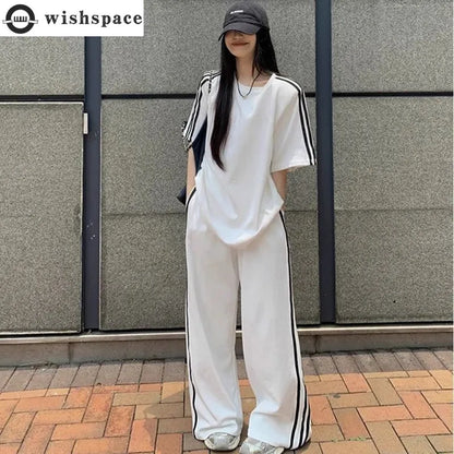 Luxury women's casual two piece set featuring a stylish striped short sleeve T-shirt in a soft cotton blend.