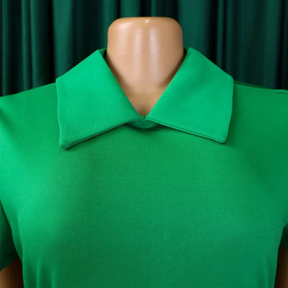 Full view of the pleated evening dress on a mannequin, displaying its chic silhouette suitable for summer events.