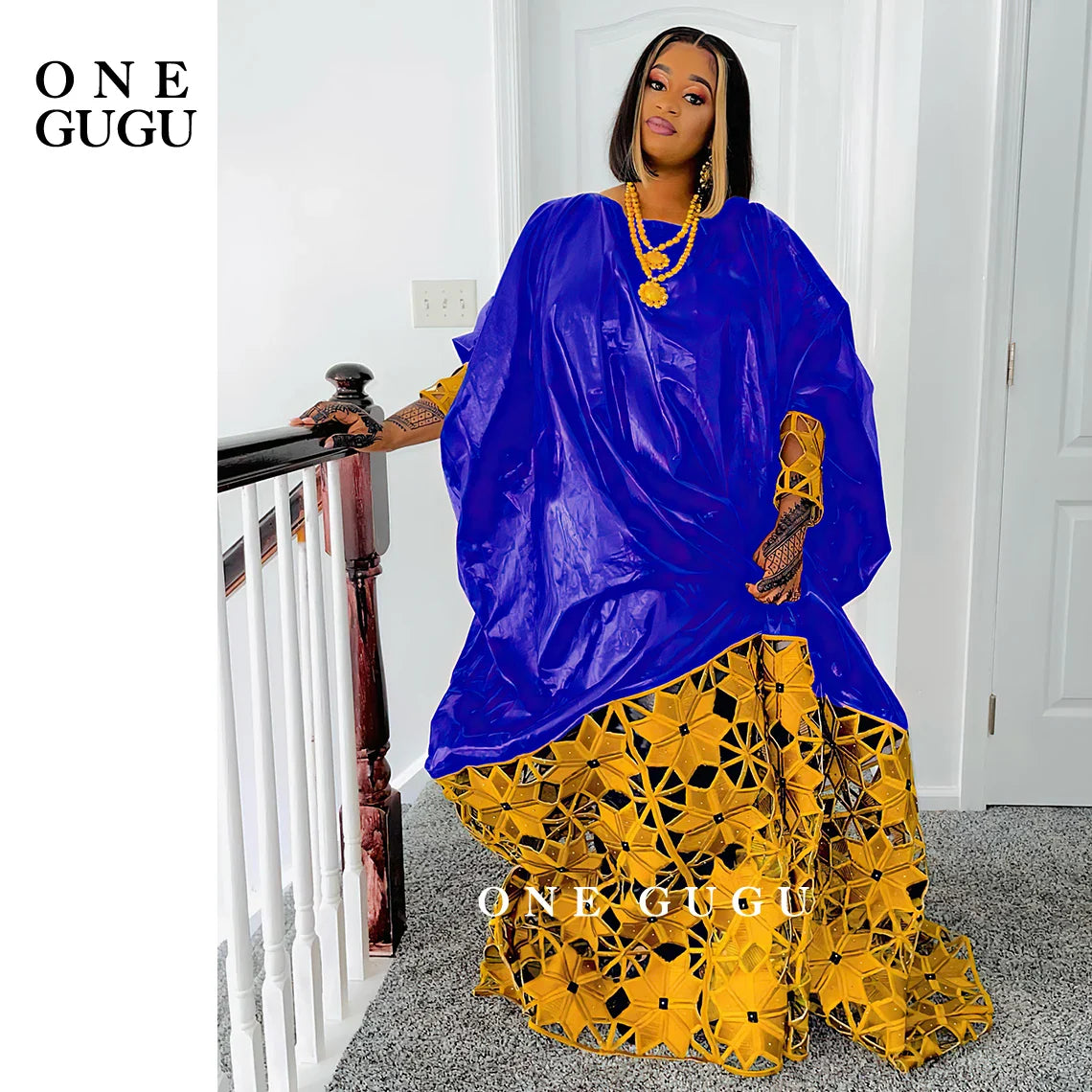 Full-length display of a chic African Bazin dress robe, perfect for special occasions like weddings and parties, exuding elegance and grace.