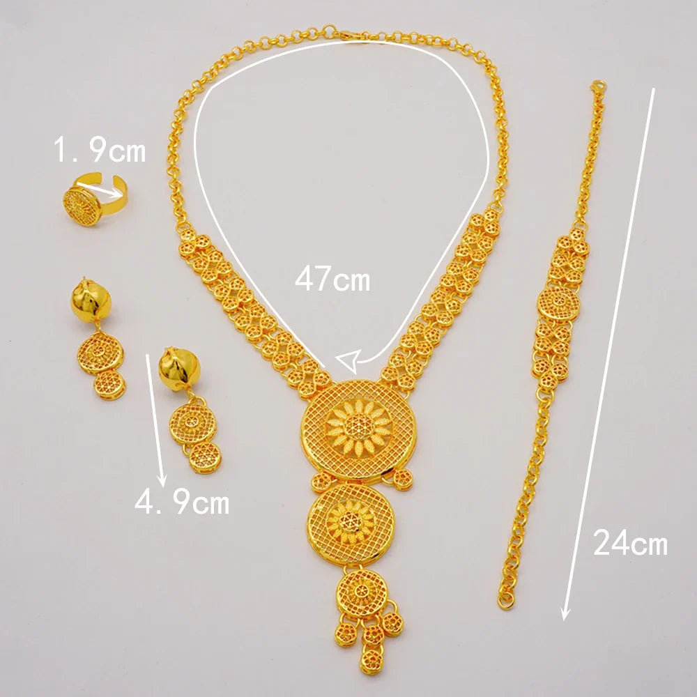 Complete luxury Dubai gold jewellery set for women showcasing a beautiful bridal necklace, earrings, bracelet, and ring with an African-inspired design.