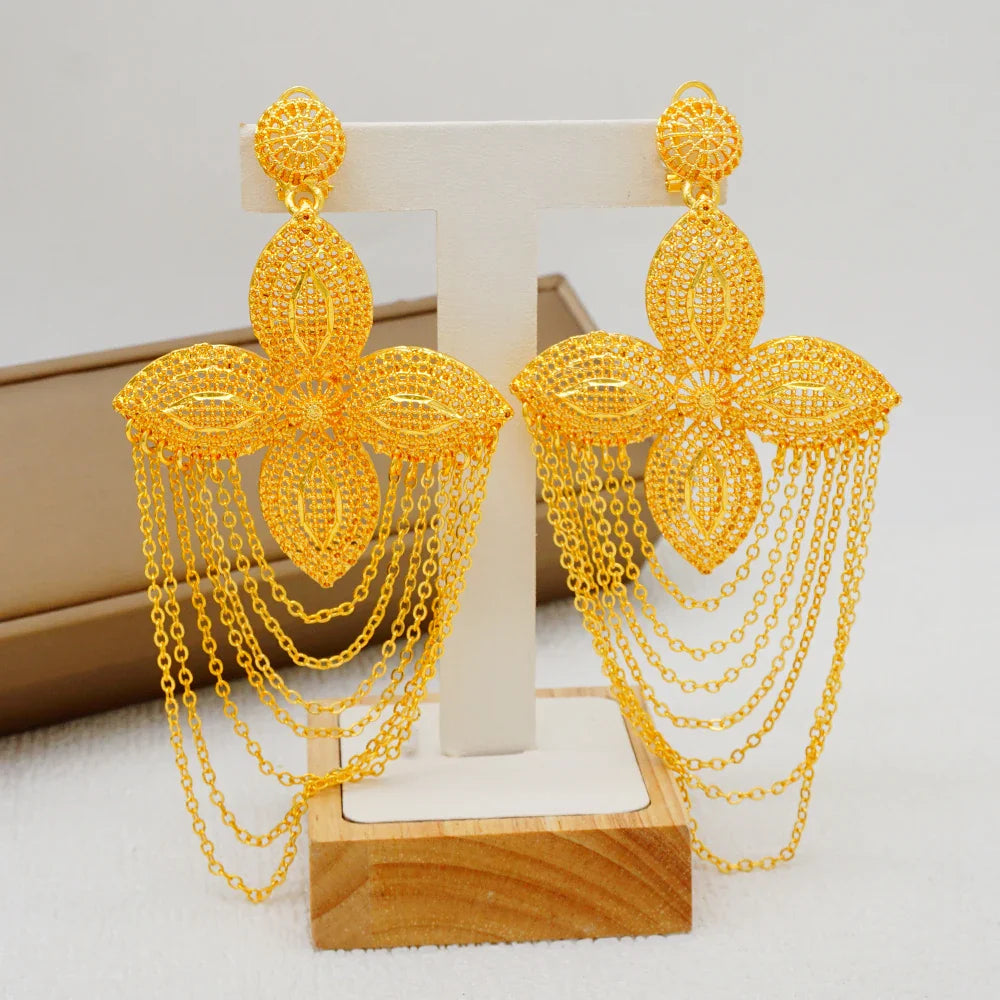 Trendy Bohemia long tassel earrings featuring geometric African-inspired design in gold, perfect for weddings and upscale events.