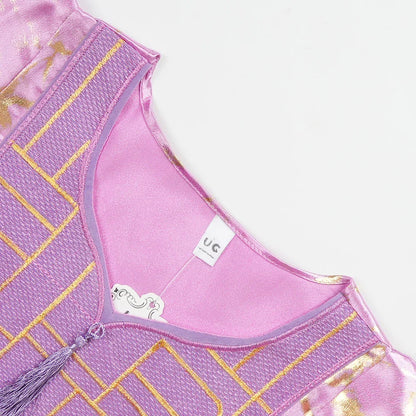 Luxury satin abaya for women featuring elegant tassel detailing, perfect for casual and upscale occasions.