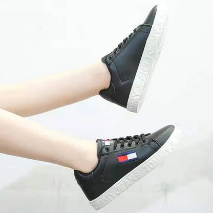 Elegant women’s Chelsea cowboy knee-high boots in luxurious black microfiber, featuring mid heels and a stylish zipper closure, ideal for a chic punk fashion statement.