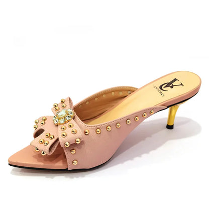 Exclusive women's high heeled shoes featuring stylish rivet design in vibrant colours, perfect for summer occasions.