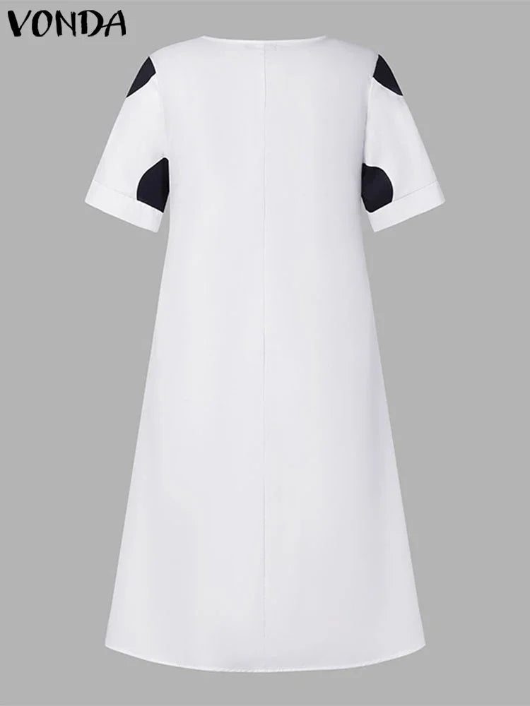 Luxurious mid-calf length VONDA Plus Size 5XL Bohemian Sundress in vibrant colours, designed for women seeking comfort and style.