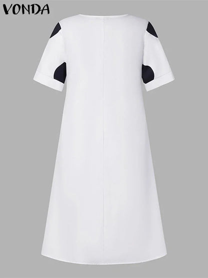 Luxurious mid-calf length VONDA Plus Size 5XL Bohemian Sundress in vibrant colours, designed for women seeking comfort and style.