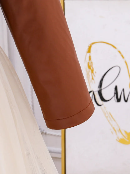 Stylish two-piece outfit for girls, showcasing a fashionable PU leather vest paired with a knee-length skirt, ideal for autumn elegance.