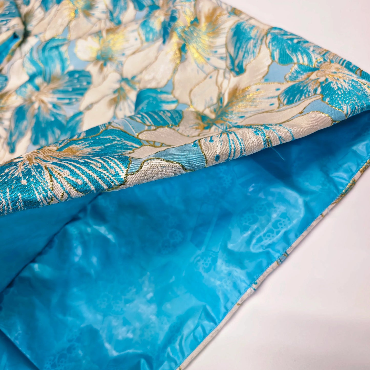 Elegant African women’s Dashiki Dress in Lake Blue with designer brocade, ideal for weddings and parties.