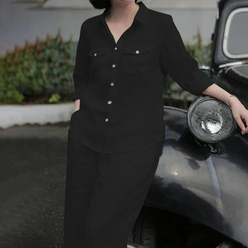 Close-up of the luxurious polyester fabric of the women's shirt and wide leg pants set, showcasing exquisite textile quality.