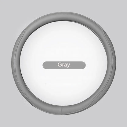 Universal fit steering wheel cover displayed on a sleek steering wheel, showcasing the exquisite Napa leather craftsmanship.