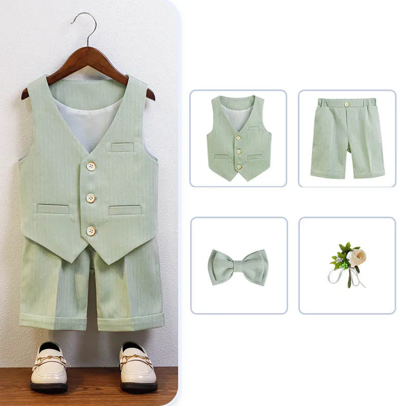 Stylish boys baptism suit set in green and white, including a vest, shirt, shorts, and bowtie perfect for ceremonies and special events.