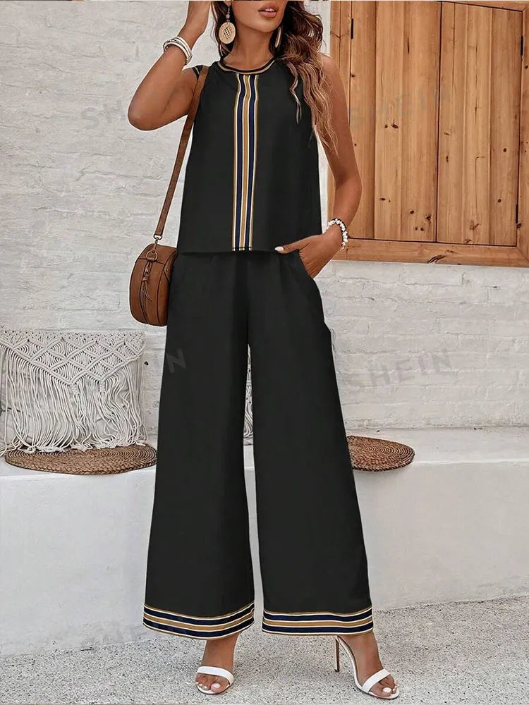 Elegant women's casual sleeveless top and long wide leg pants set in chiffon, perfect for summer outings.