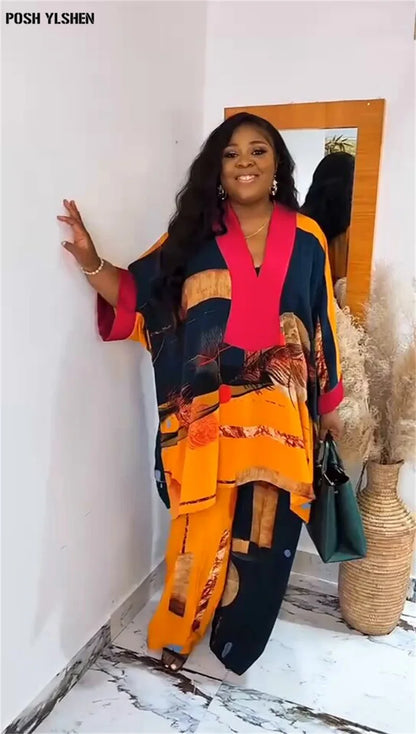 Glamorous close-up of vivid design on Plus Size Dashiki set, highlighting craftsmanship and cultural elegance for contemporary women.