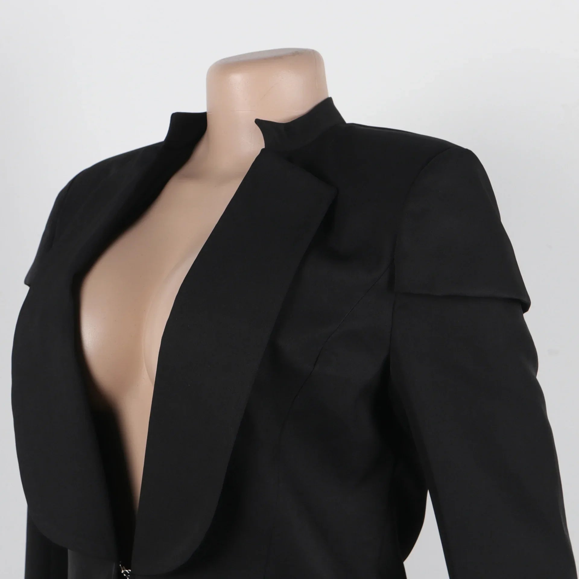 Women's X-Long Blazer Coat elegantly styled for autumn/winter, showcasing full sleeves and a sophisticated notched collar, perfect for high-class office attire.
