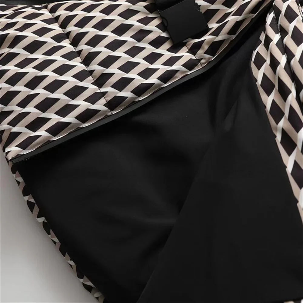 Trendy hooded jacket for women in a solid design, ideal for layering during winter skiing adventures.