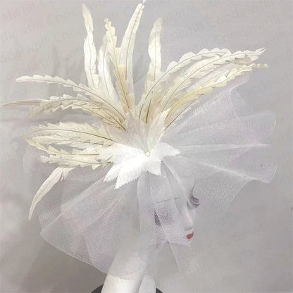 Chic and elegant feather pillbox cap for women, ideal for weddings and special events, featuring a lightweight design for comfort and style.