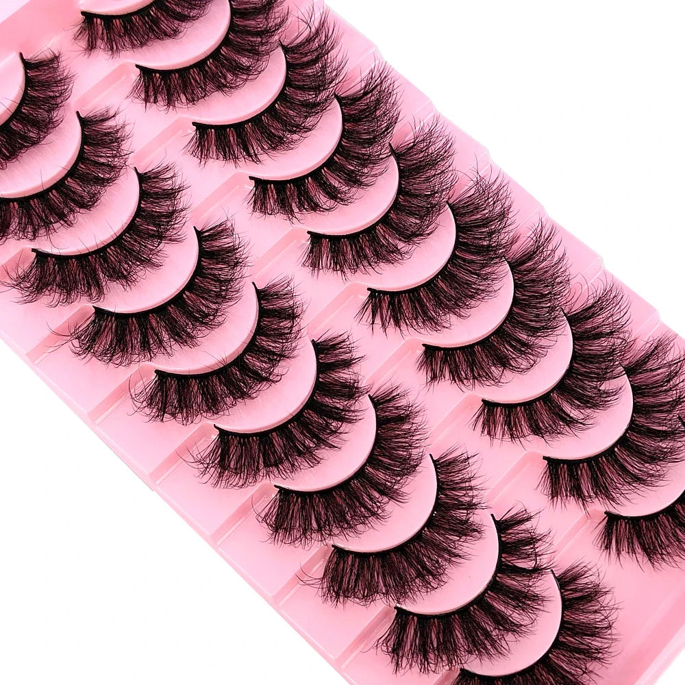 Elegant display of 10 pairs of handmade faux mink lashes, emphasising the high-quality synthetic hair material for a voluminous effect.