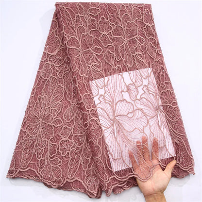 Luxurious African Milk Silk Mesh Lace Fabric embellished with sequins, ideal for exquisite Nigerian wedding dresses, featuring a 51-52 inch width.