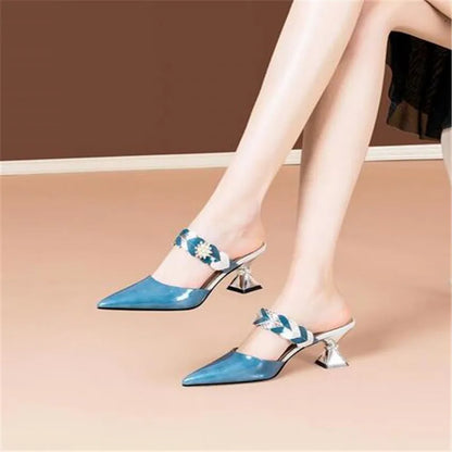 Chic fur upper slides with geometric pattern, providing comfort and sophistication for any outfit.