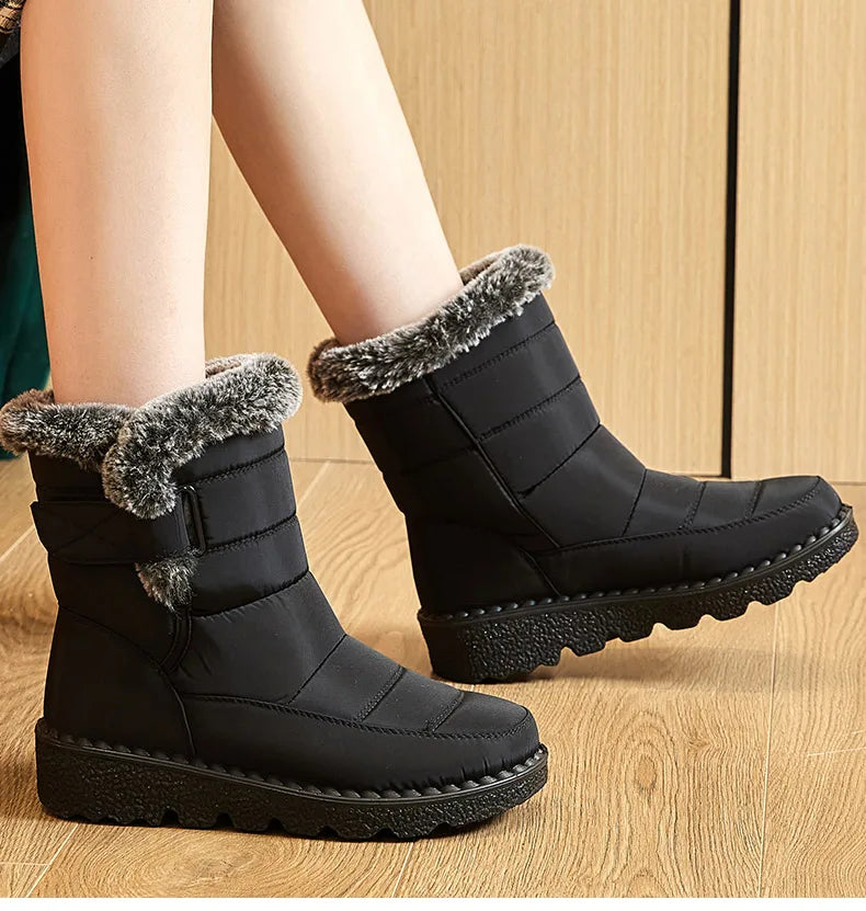 Korean style women's luxurious snow boots crafted from non-woven material, showcasing a chic round toe silhouette for sophistication.