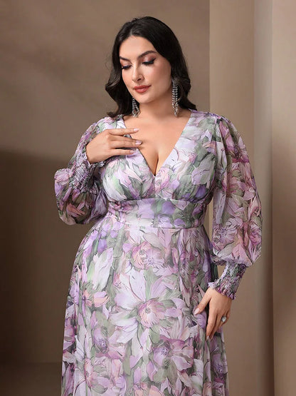 Close-up of intricate floral patterns on TOLEEN Plus Size Women’s Long Dress, accentuated by a sophisticated V-neckline and airy lantern sleeves.
