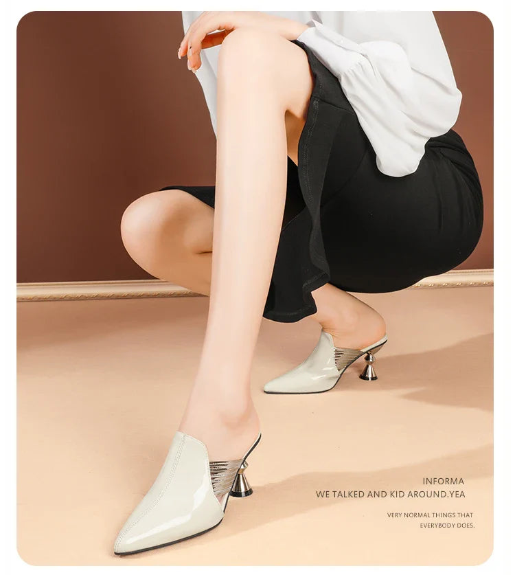 Close-up of the high-quality PU upper material of women's elegant slippers, showcasing luxurious craftsmanship and fashionable style.