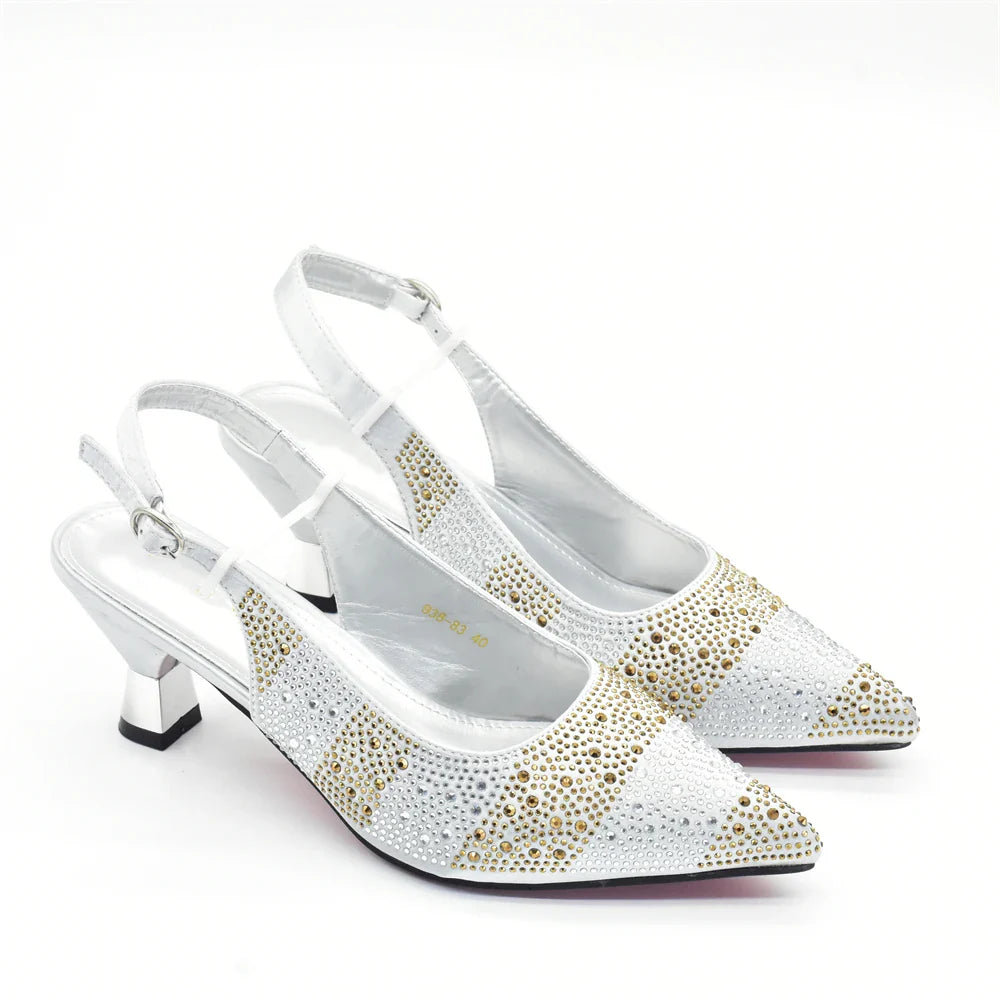 Exquisite silver and crystal embellished pumps from the Italian designer shoe and bag set for women, showcasing elegance and sophistication.