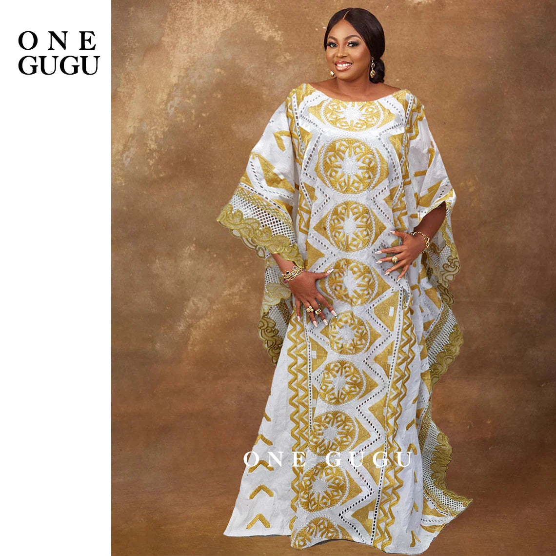 Elegant Original Nigerian Bazin Dress Dashiki in exquisite gold brocade, showcasing intricate embroidery, perfect for women seeking luxury fashion in white.