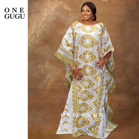 Elegant Original Nigerian Bazin Dress Dashiki in exquisite gold brocade, showcasing intricate embroidery, perfect for women seeking luxury fashion in white.
