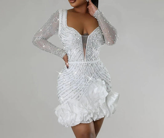 Elegant women's sexy rhinestone beaded dress featuring a high waist and intricate appliques, perfect for upscale clubwear, styled above the knee.